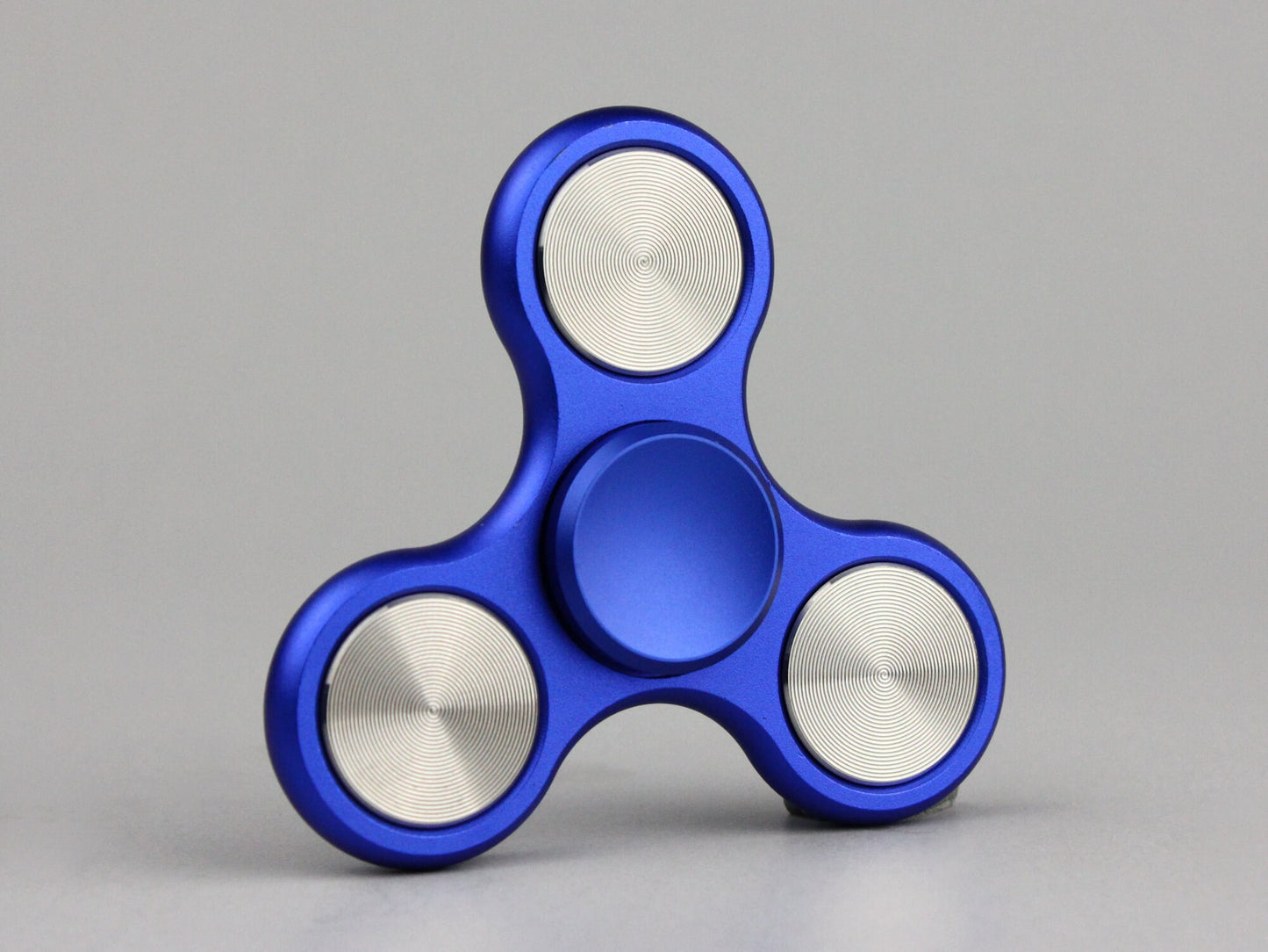 The Classic fidget spinner - tri shape metal spinner, in black, silver, blue, red, and orange