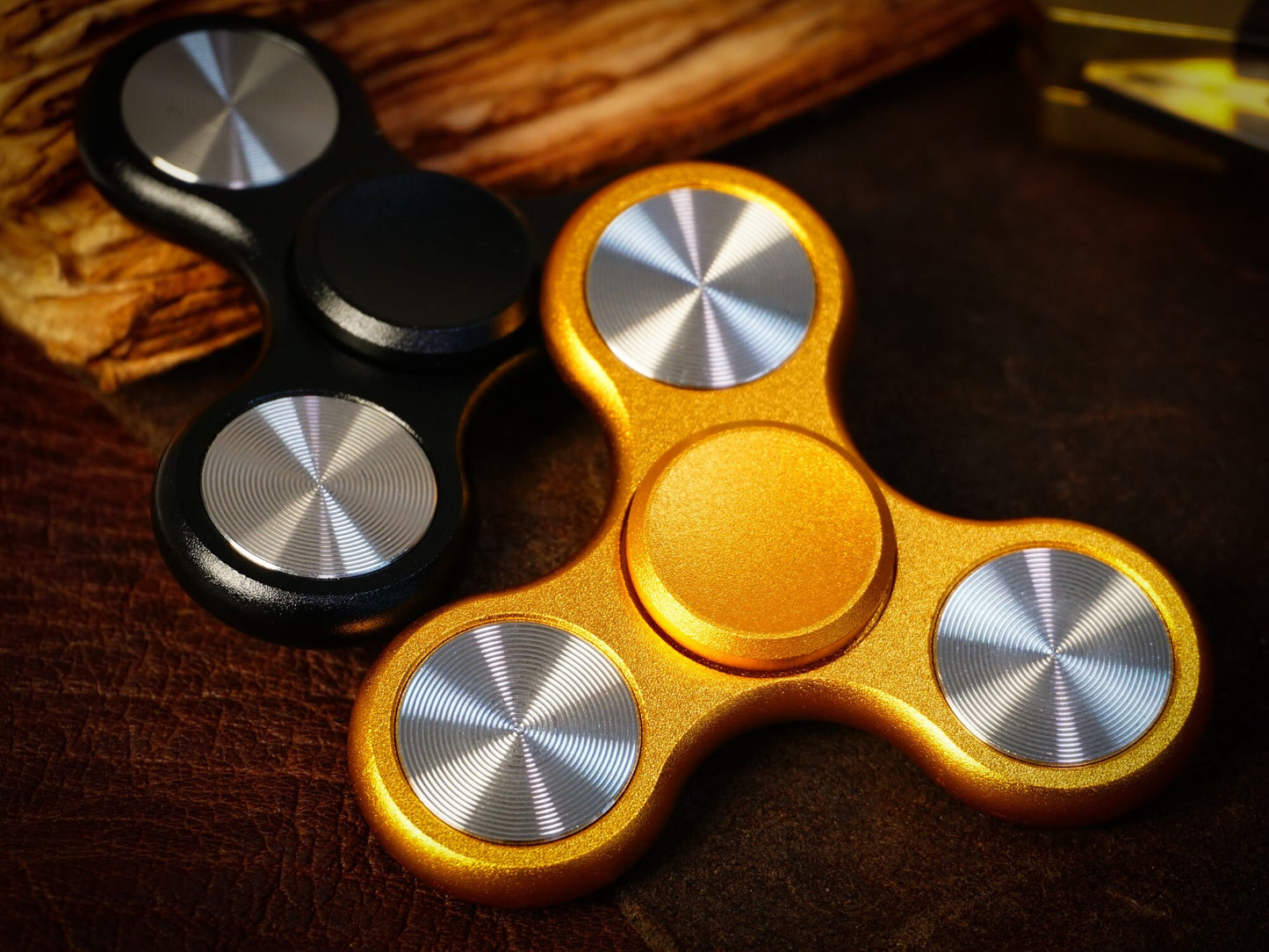 The Classic fidget spinner - tri shape metal spinner, in black, silver, blue, red, and orange