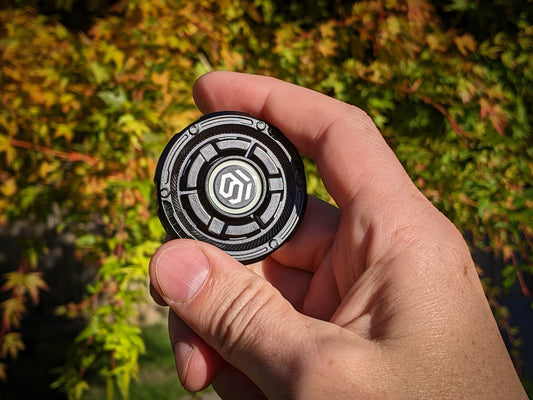 Mecha UFO fidget spinner - round haptic clicker, black glow in the dark spinner