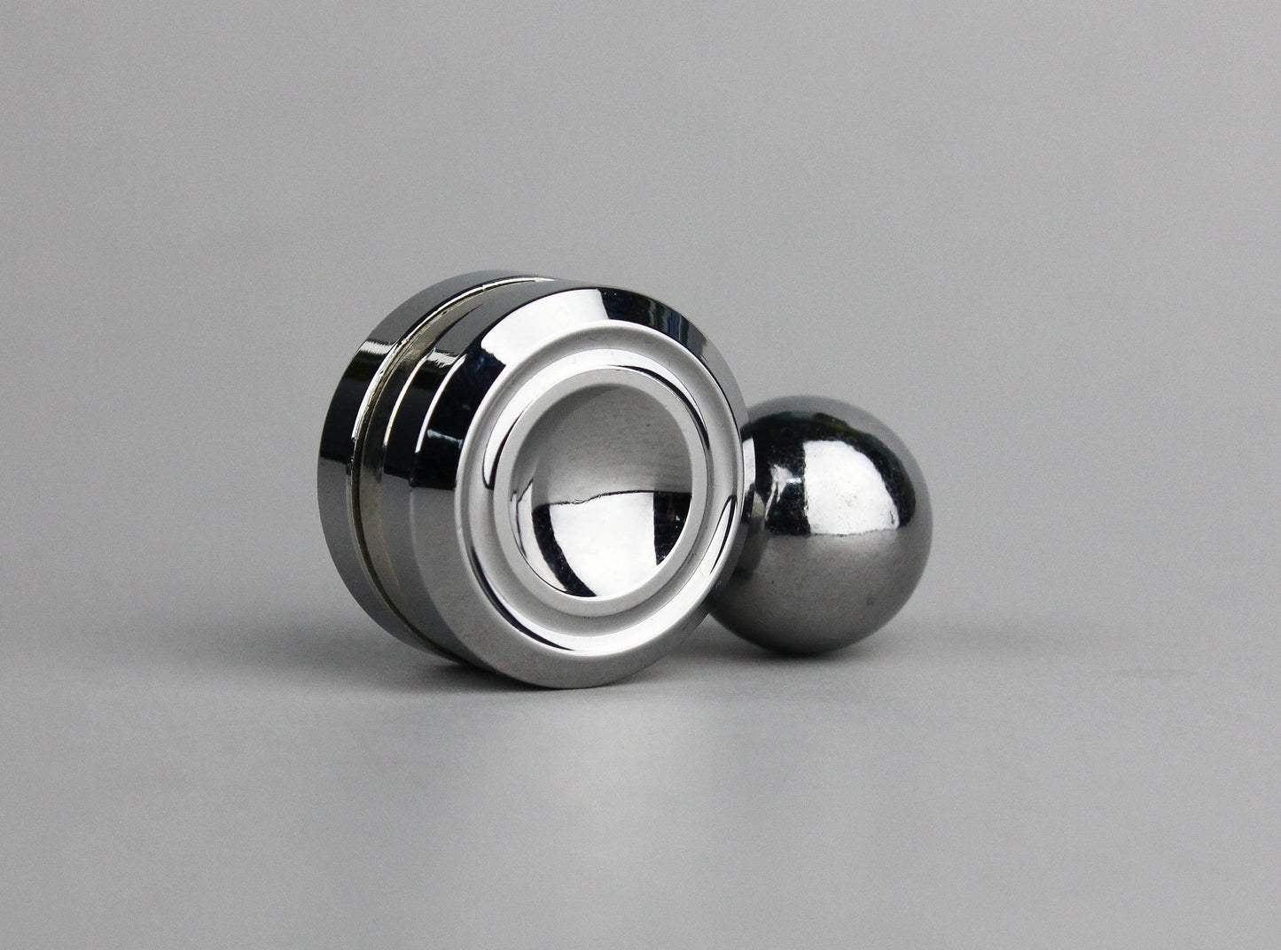 Orbit fidget Roller, steel ball magnet finger spinner