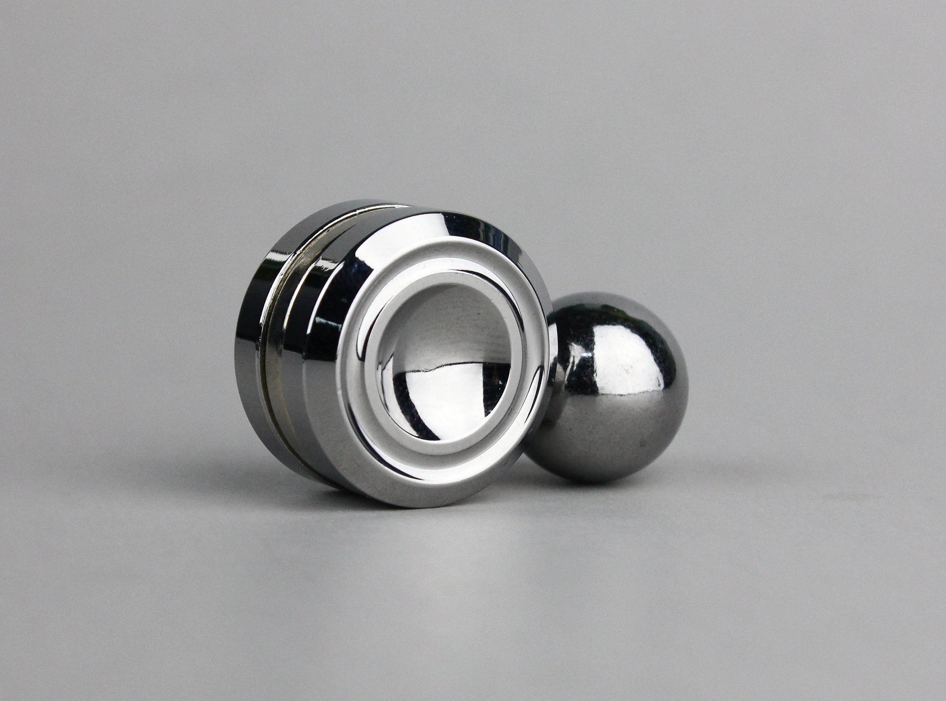 Orbit fidget Roller, steel ball magnet finger spinner