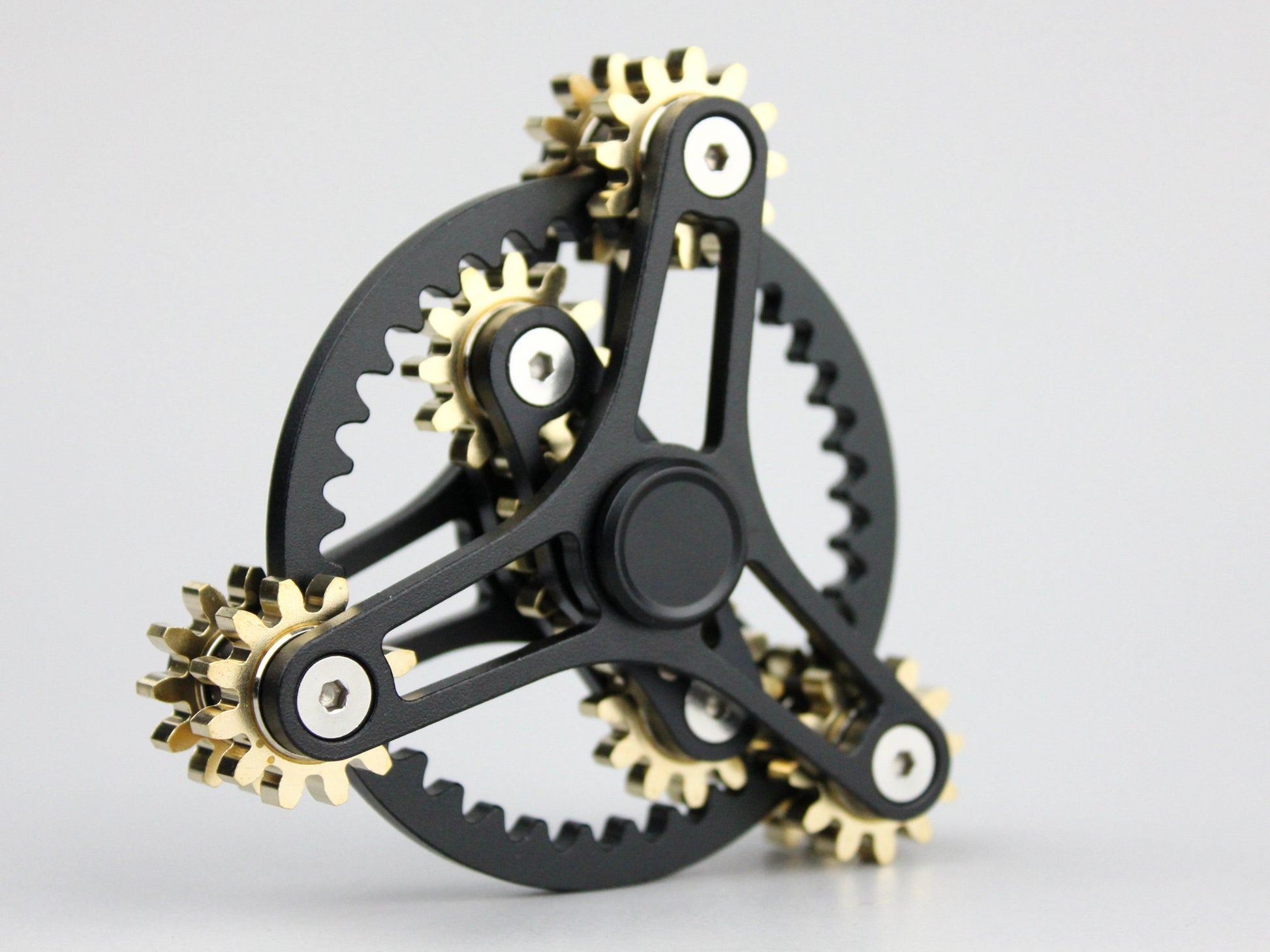 Clockwork - 9 gear fidget spinner, large kinetic cog spinner, black or silver and brass