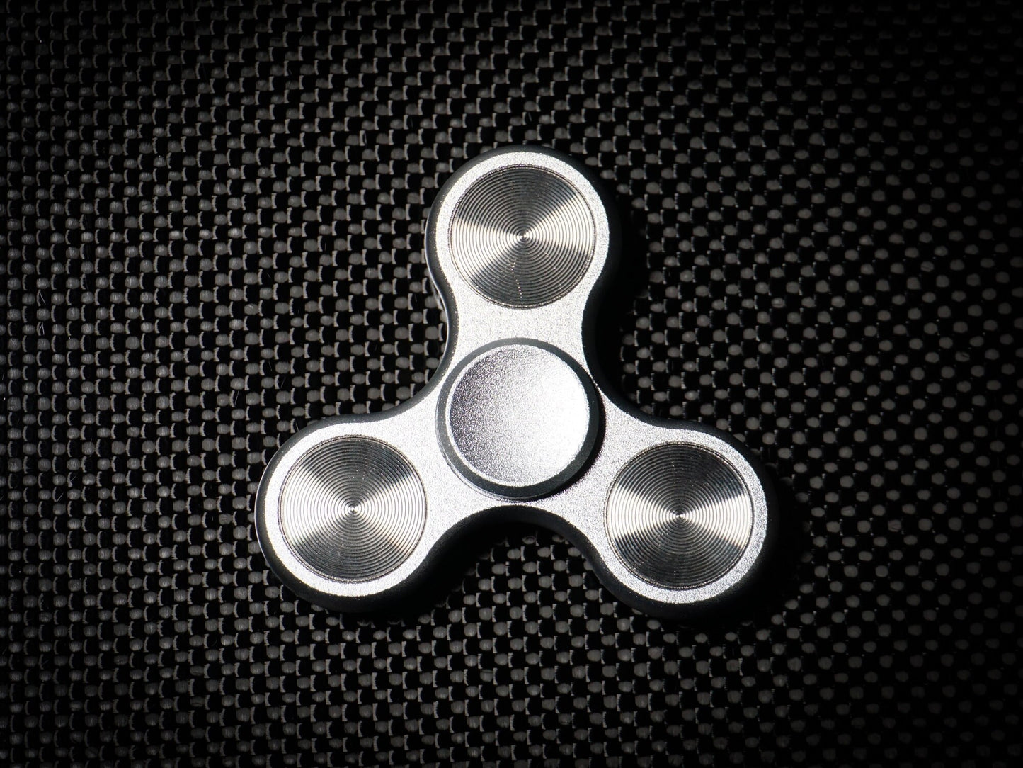 The Classic fidget spinner - tri shape metal spinner, in black, silver, blue, red, and orange